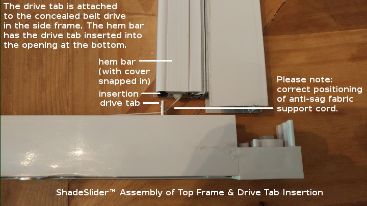 ShadeSlider for skylights and bottom-up windows - inserting drive tab into hem bar